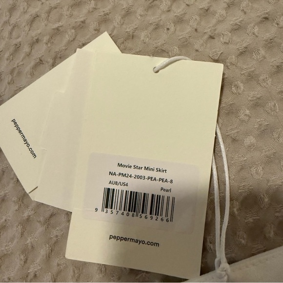 PepperMayo white sequins shell mini skirt
BRAND NEW, no issues just too tight - Picture 2 of 4